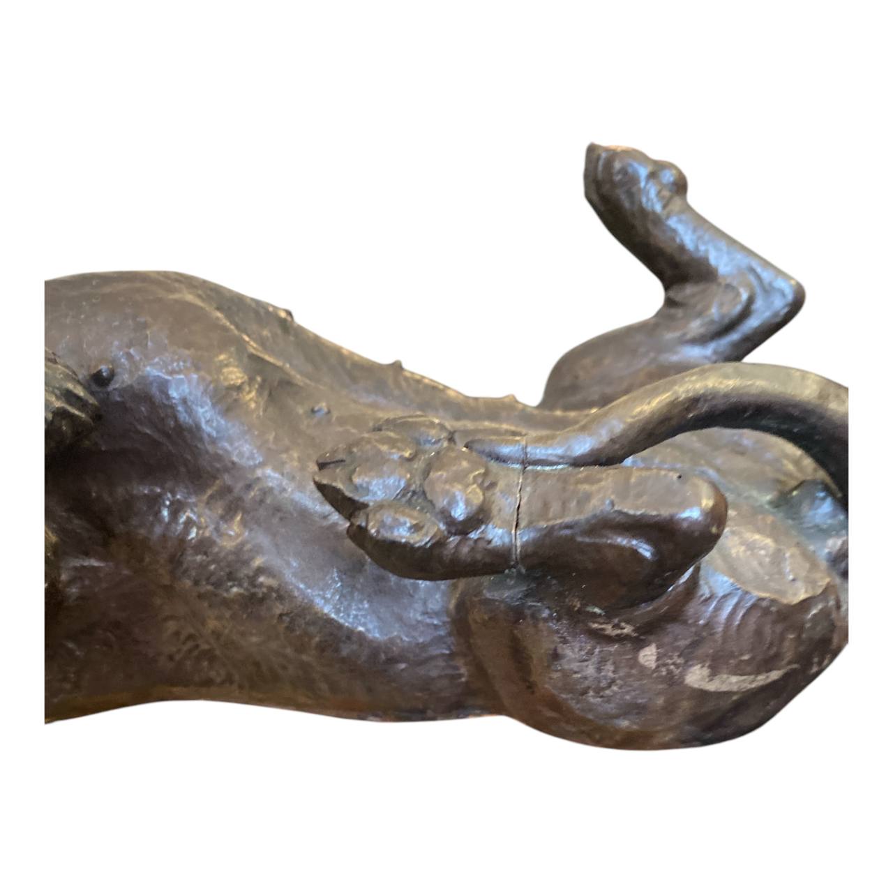 DORIS LINDNER "Rolling Dachshund" - Bronze coated resin sculpture.